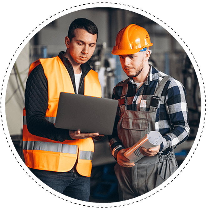 Construction Foreman Looking at a laptop